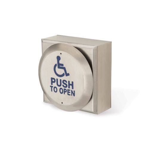 A stainless steel push to open button with a handicap symbol on it.