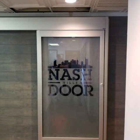 Automatic Doors Installation and Repair - A nashville door with a city skyline on it