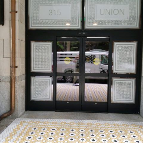 Automatic Doors Installation and Repair - A building with the number 315 on it