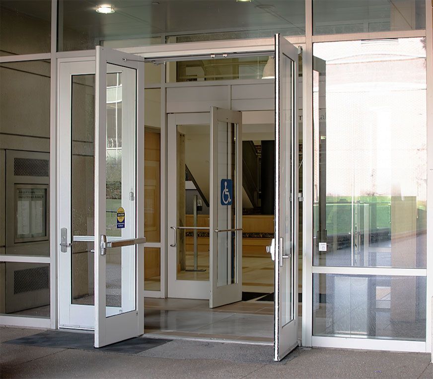 A building with a handicap sign on the door