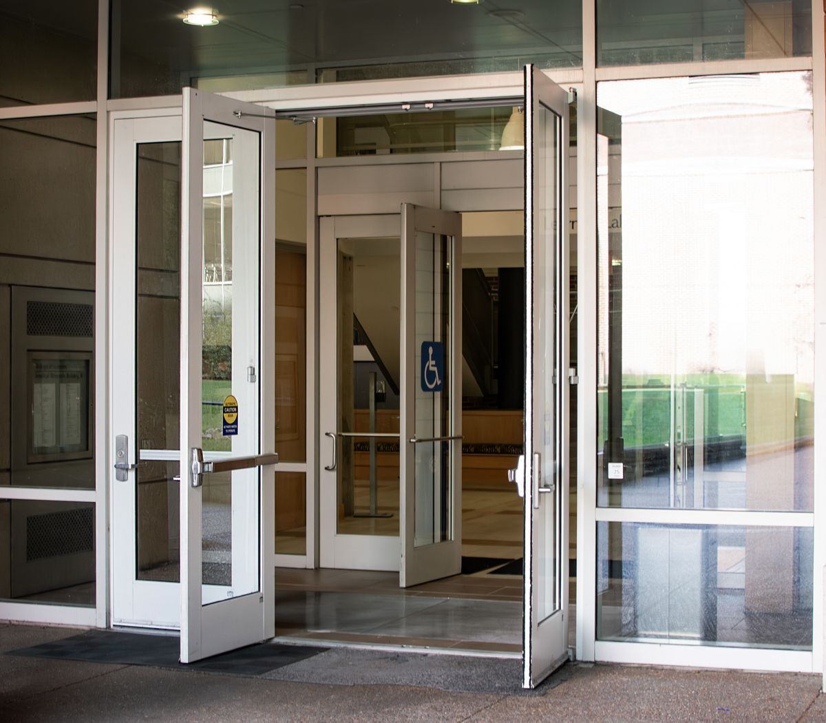 A building with a handicap sign on the door