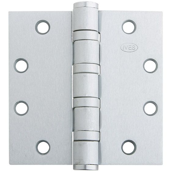 A close up of a stainless steel door hinge on a white background