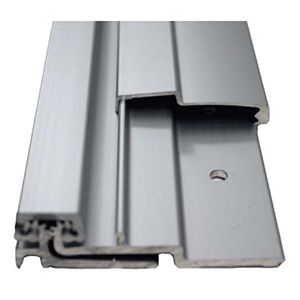 A close up of a metal door frame on a white background.