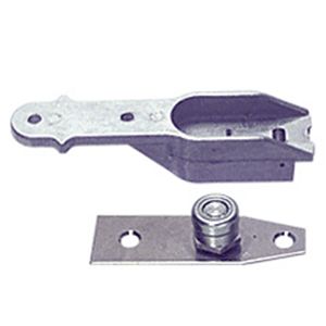 A close up of a metal object with a ball bearing on a white background.