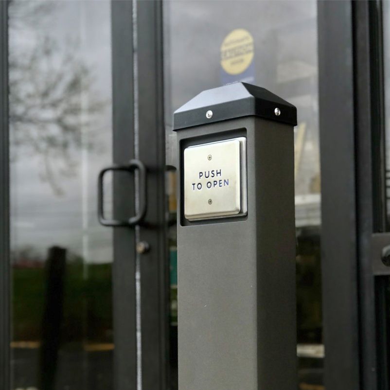 A door with a push to open sign on it