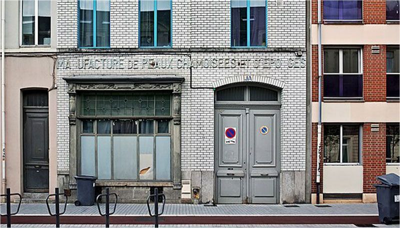 A building with a no parking sign on the door