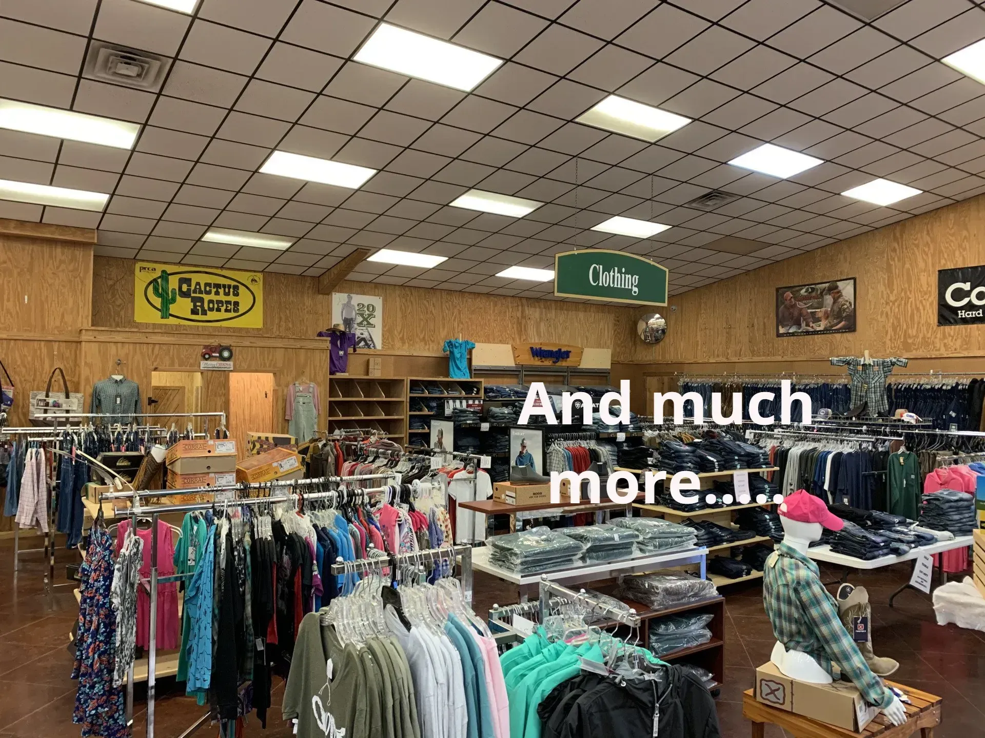 A clothing store with a sign that says `` and much more ... ''
