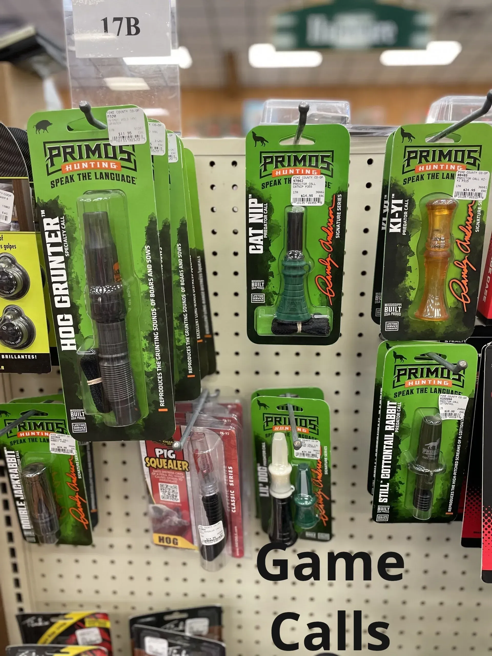 Game calls are displayed on a shelf in a store