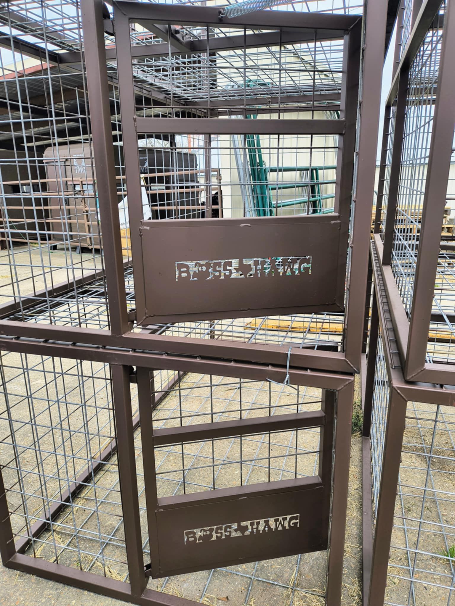A close up of a metal cage with the word factory written on it