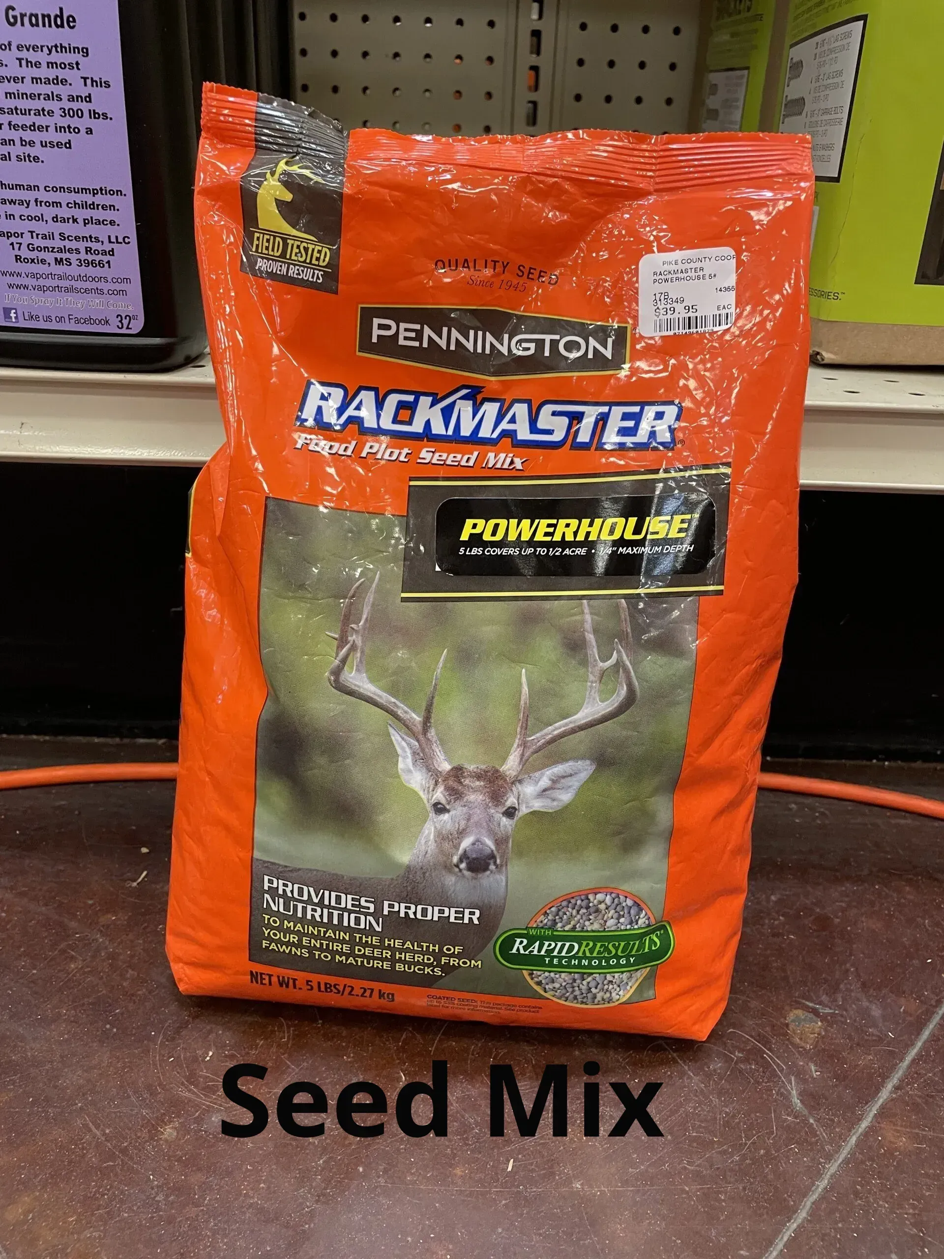 A bag of rackmaster seed mix sits on a shelf