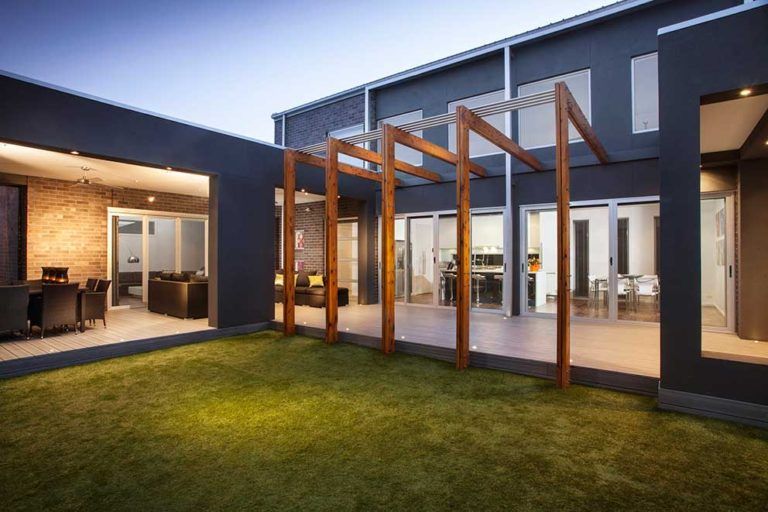 Security Screen Door in Backyard— Glass & Aluminium Windows & Doors In Yeppoon, QLD