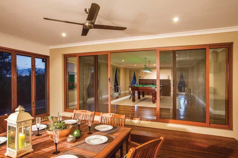 Security Screen Door in Dining Room — Glass & Aluminium Windows & Doors In Yeppoon, QLD