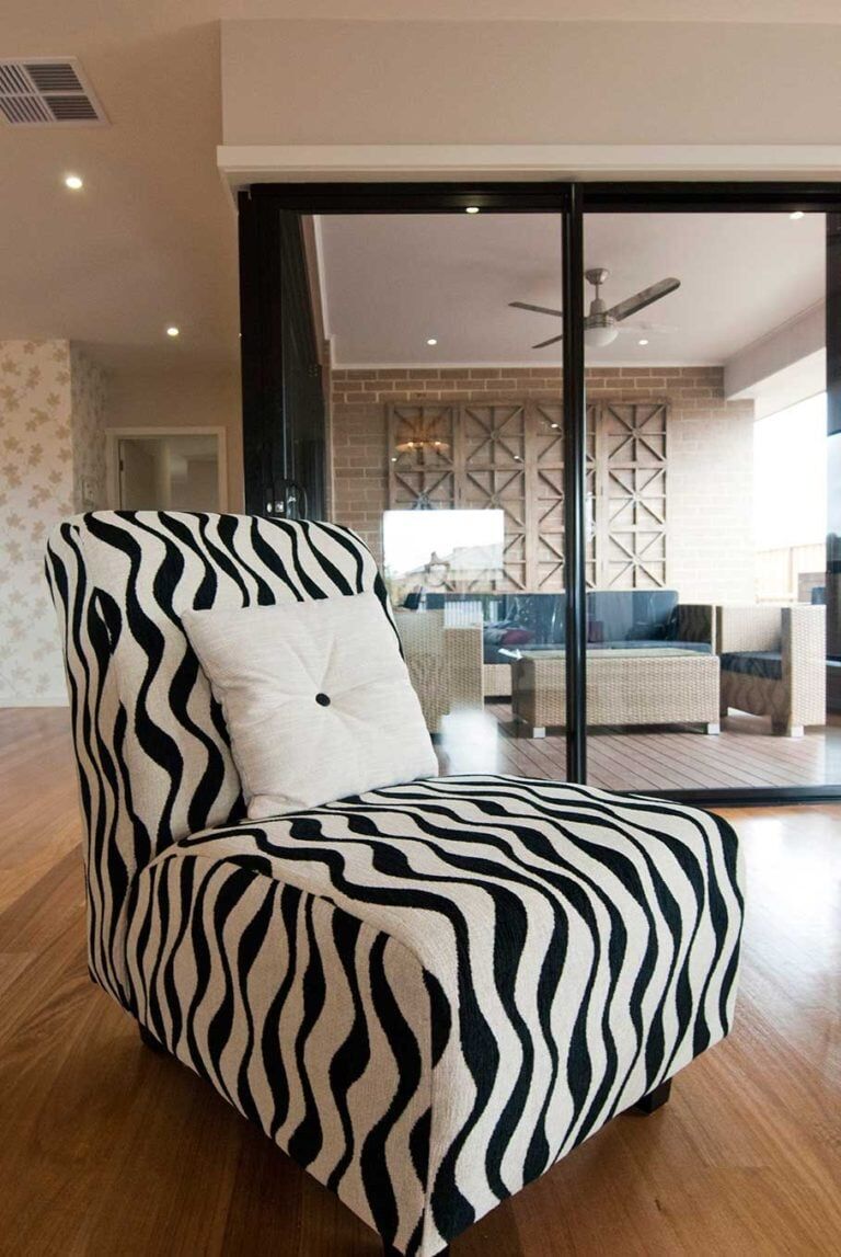 Black And White Striped Chair — Glass & Aluminium Windows & Doors In Yeppoon, QLD