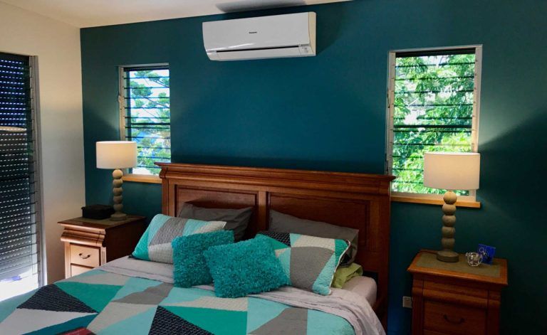 Dark Teal Painted Wall — Glass & Aluminium Windows & Doors In Yeppoon, QLD