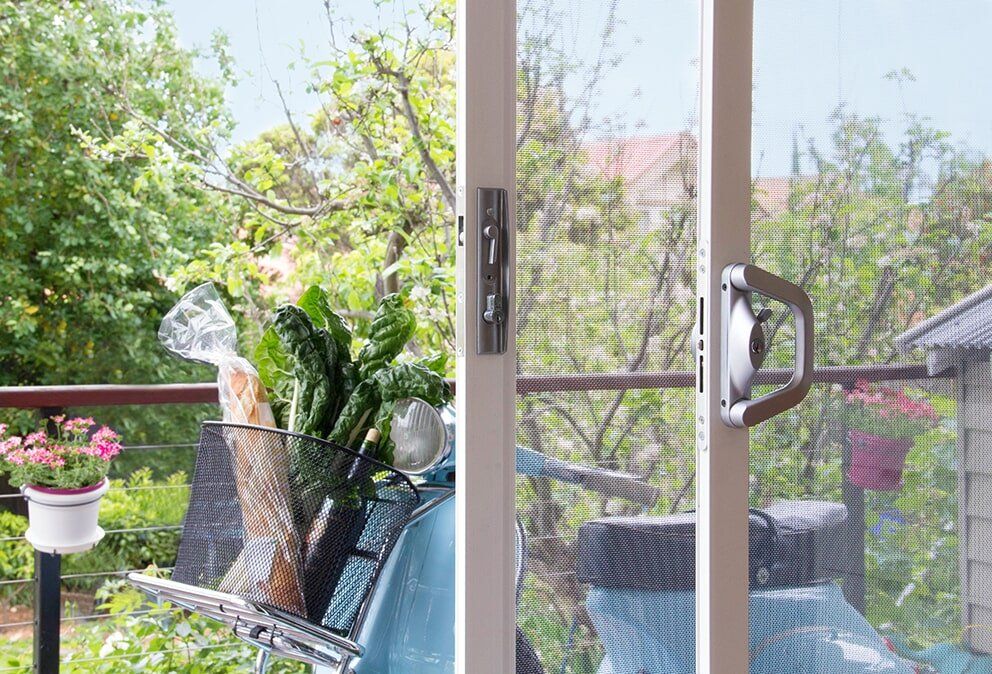 Open Amplimesh Door— Glass & Aluminium Windows & Doors In Yeppoon, QLD