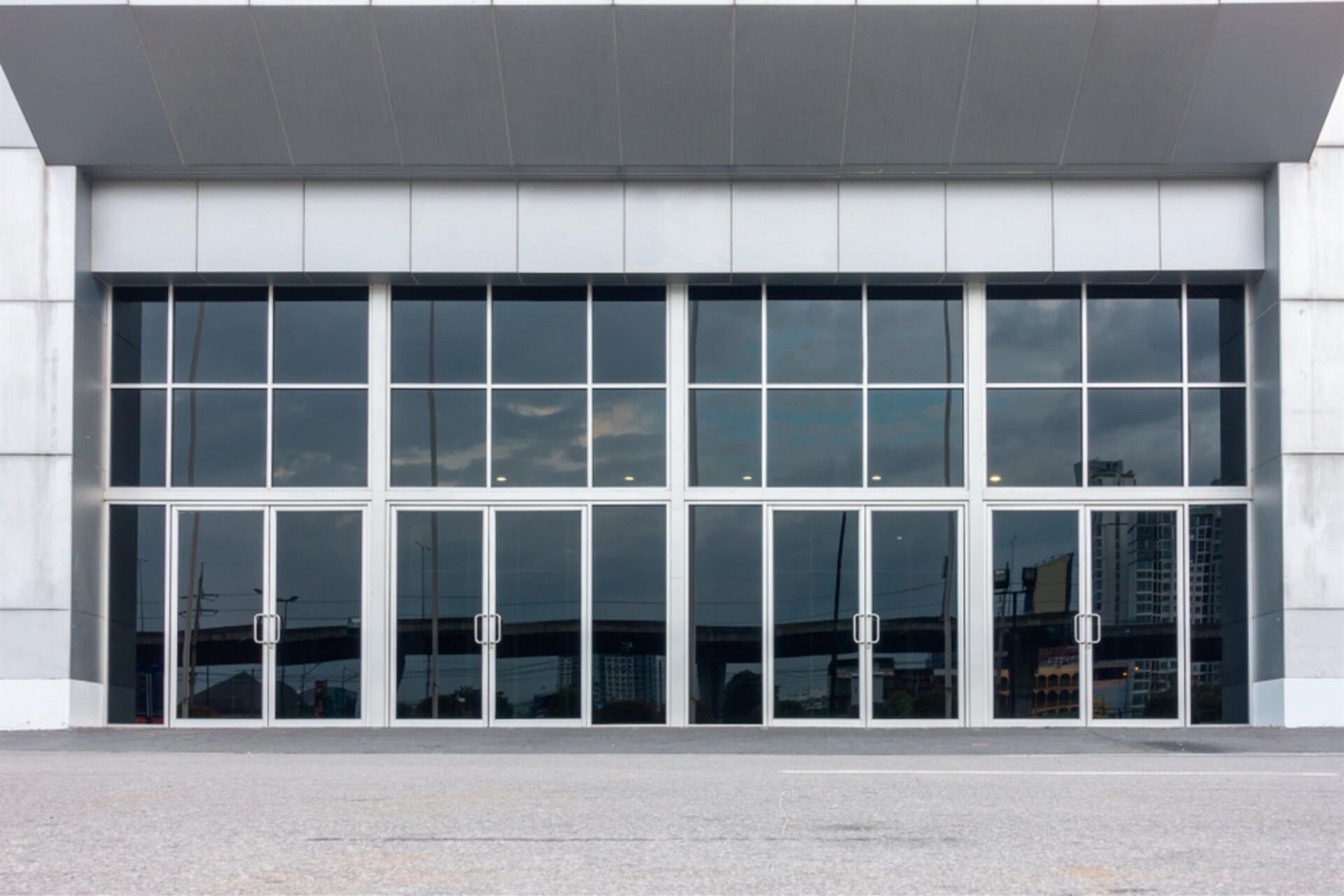 Commercial Shopfront Glass Black Sliding Door — Glass & Aluminium Windows & Doors In Yeppoon, QLD