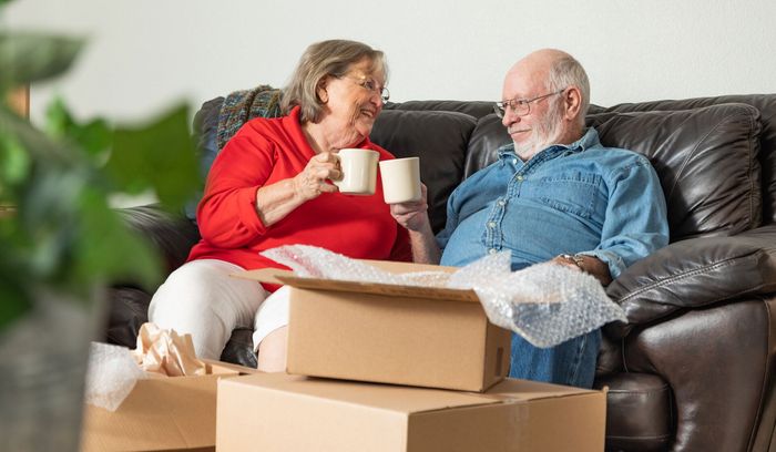 Elder Couple With Moving Boxes — Maple Grove, MN — 1st Choice Movers LLC