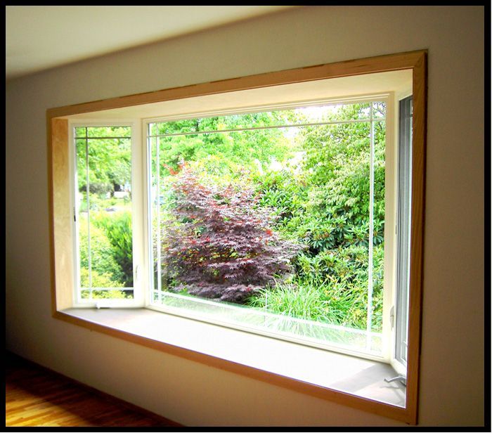 Large Window with a View of a Garden — Lane County, OR — Emerald Valley Weatherization