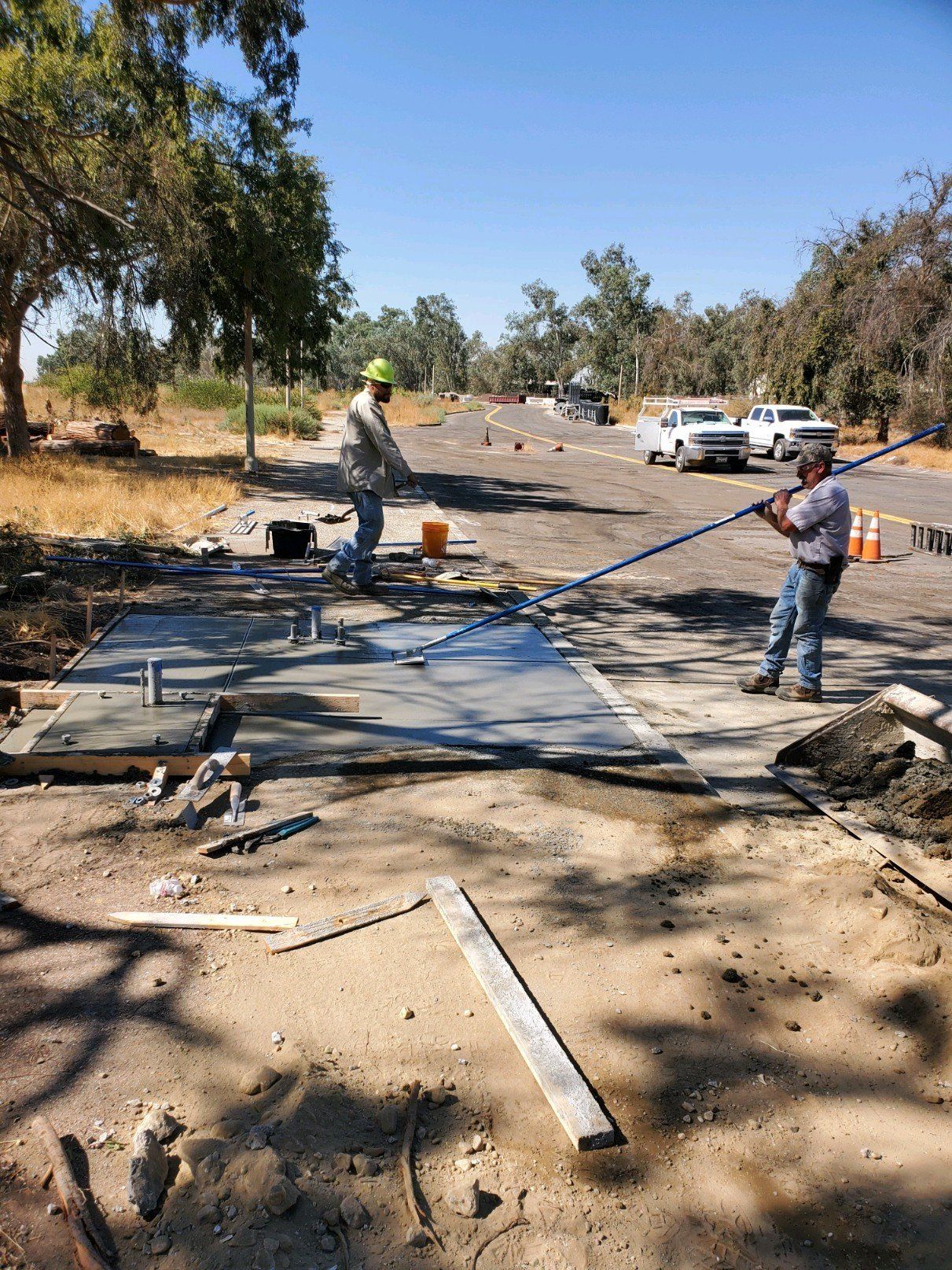 Workers fixing the road — Beaumont, CA — M. Brey Electric, Inc