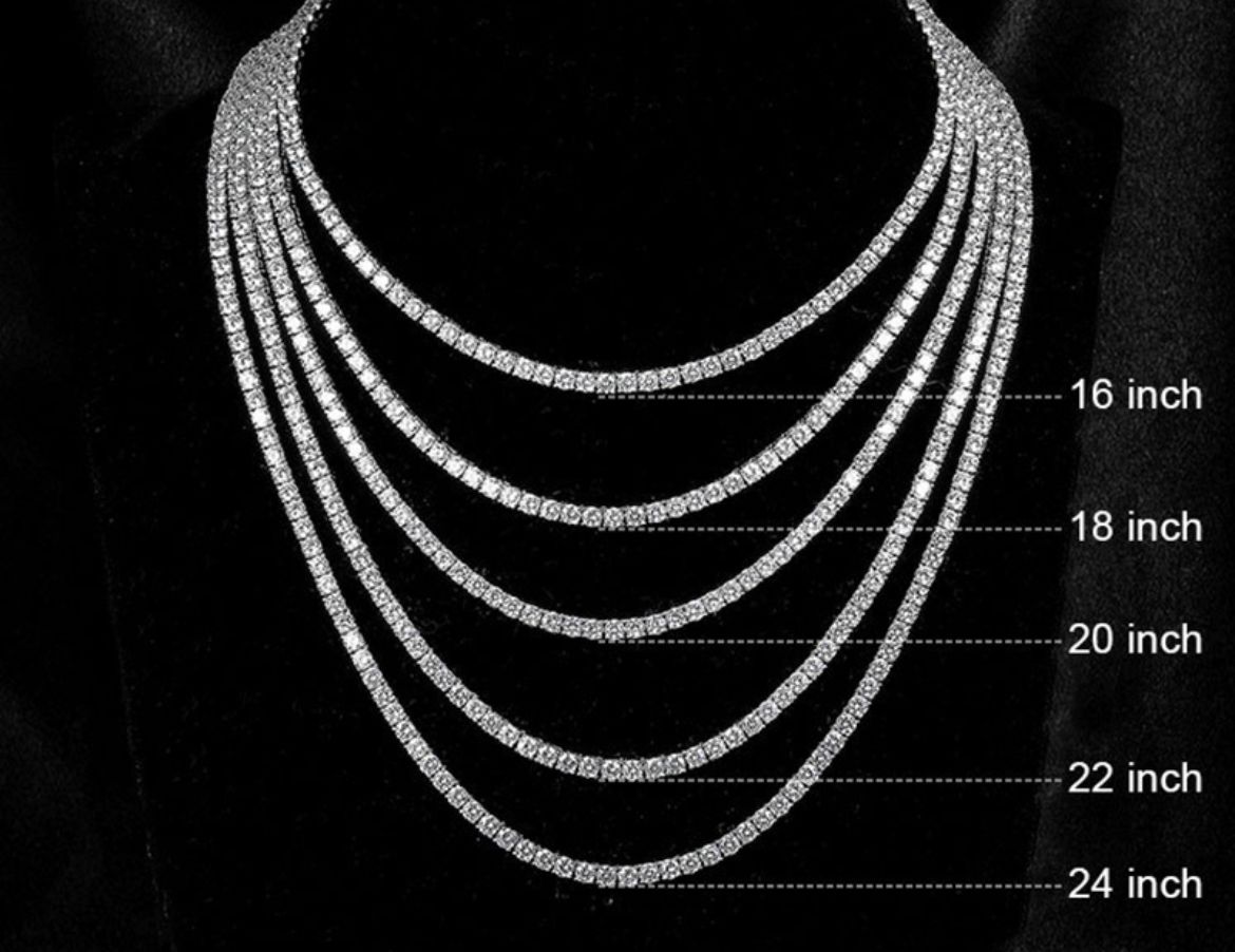 Diamond necklaces of varying lengths, labeled 16 to 24 inches, displayed against a dark background.