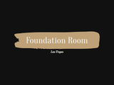The logo for the foundation room in las vegas is a heart with flames coming out of it.