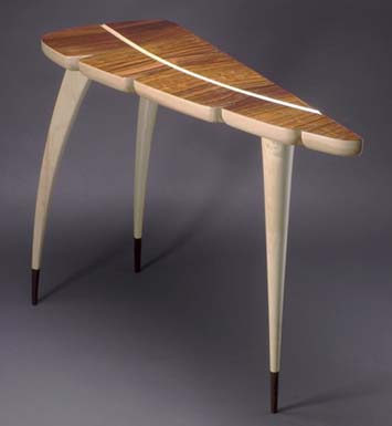 Rosewood veneer is a five ply with mahogany as the other layers