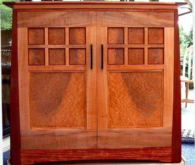 Wine cabinet in solid bubinga and madrone burl