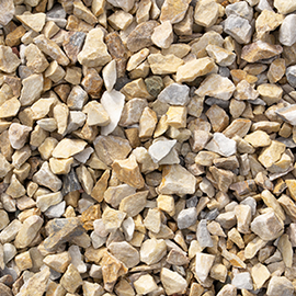 A pile of gravel is sitting on the ground.