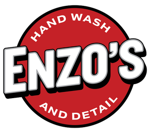 Logo for Enzo's Hand Wash and Detail, red circle with white text: "ENZO'S" in large letters, "HAND WASH" and "AND DETAIL."