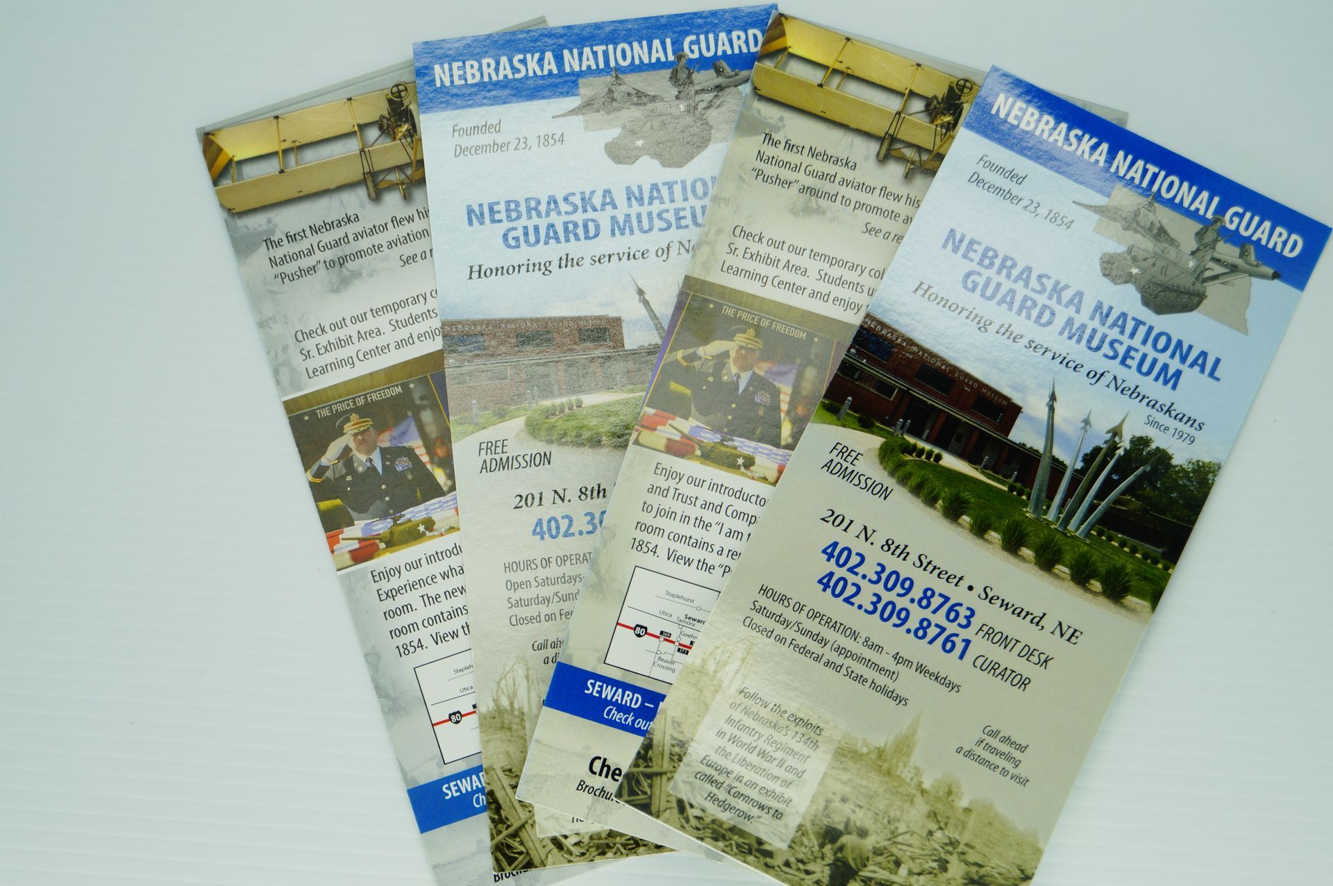 A stack of brochures for the nebraska national guard museum