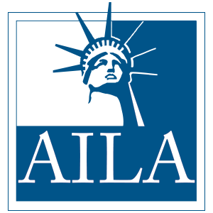 A blue and white logo for aila with the statue of liberty