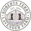 The logo for roberts ferry lavender farm shows a barn with purple flowers in front of it.