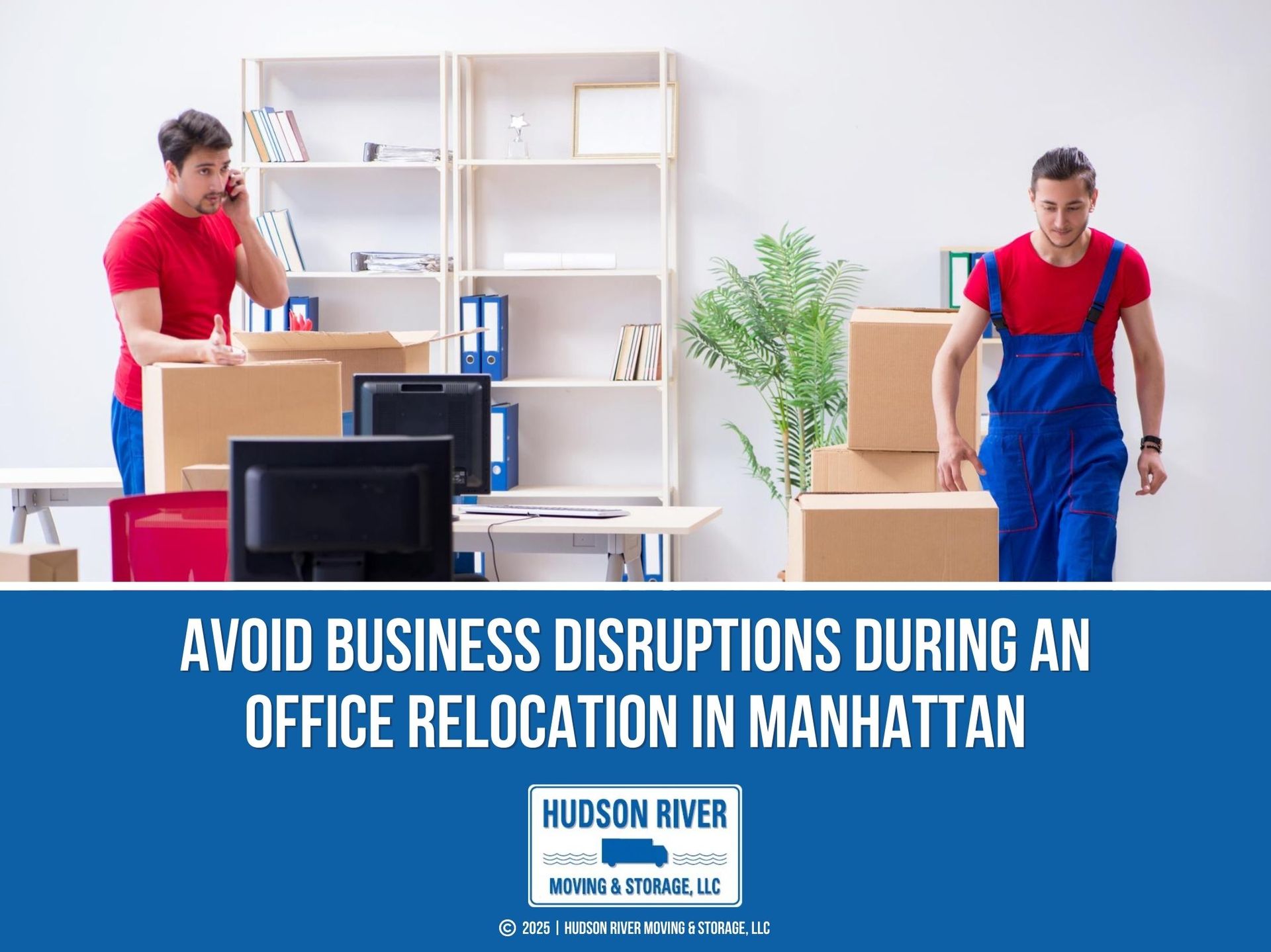 Two men are moving boxes in an office, one is on the phone while the other is stacking boxes