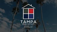 A blue realtor logo on a white background