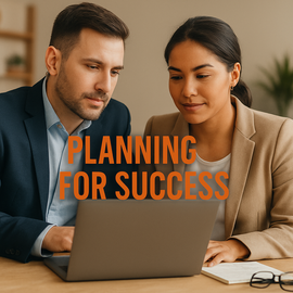 Man in a suit talking with a woman in a suite with a laptop in front of them. With the words Planning for Success over the image. 