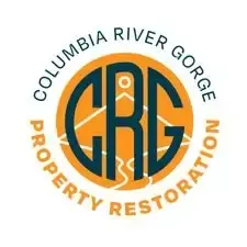 A woman wearing sunglasses is smiling while sitting in a car.