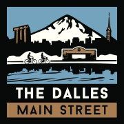 A logo for the dalles main street with a mountain in the background.