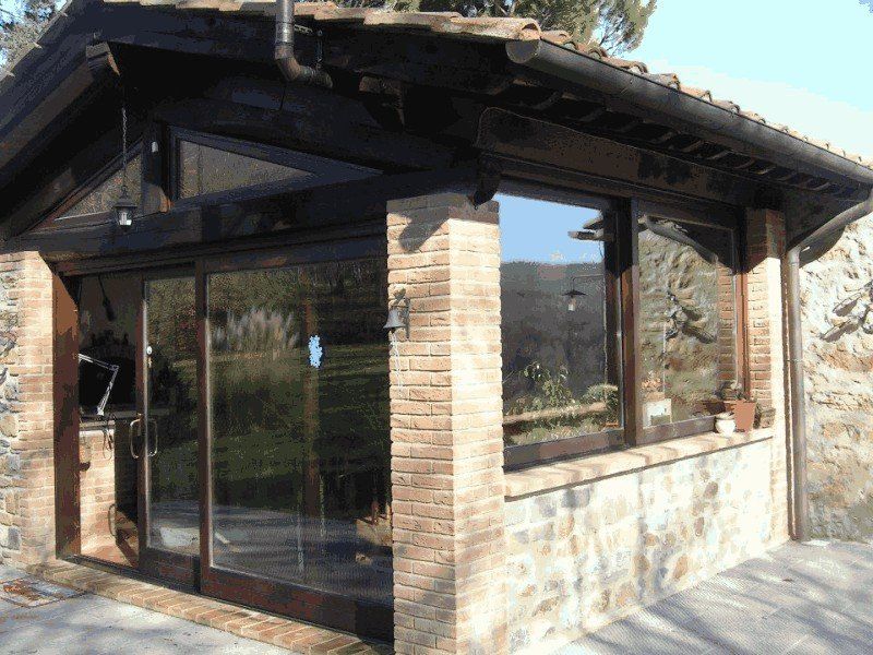 veranda esterna con porta finesta scorrevole