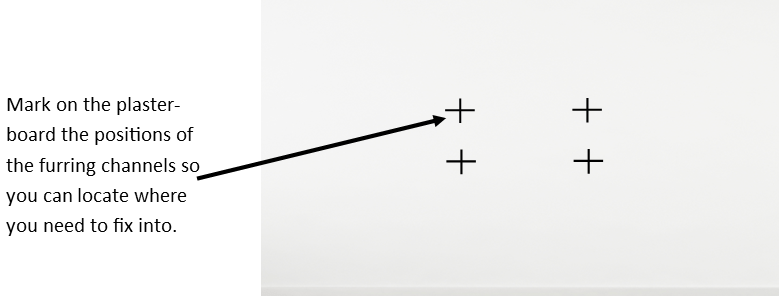 Marking the positions of the ReductoClip furring channels onto plasterboard