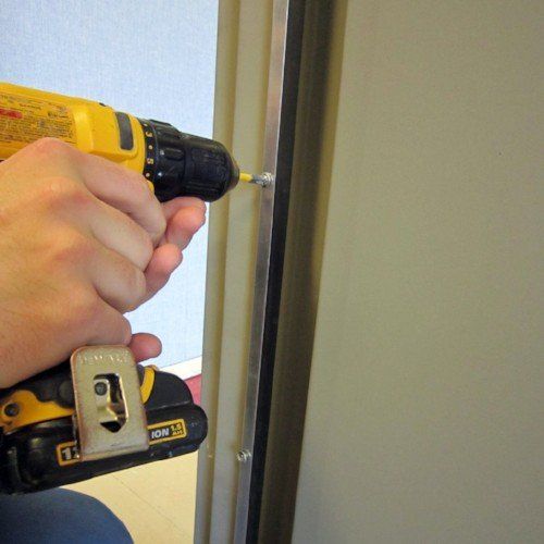 Installing acoustic door seal