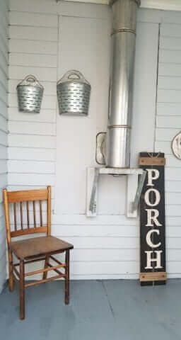 Wooden chair, galvanized buckets, and 
