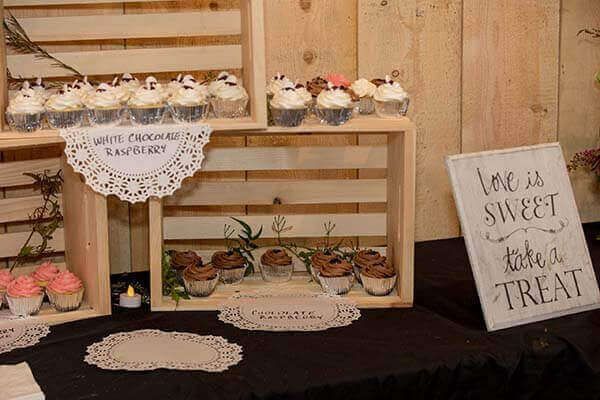 Cupcake display on wooden crates with 