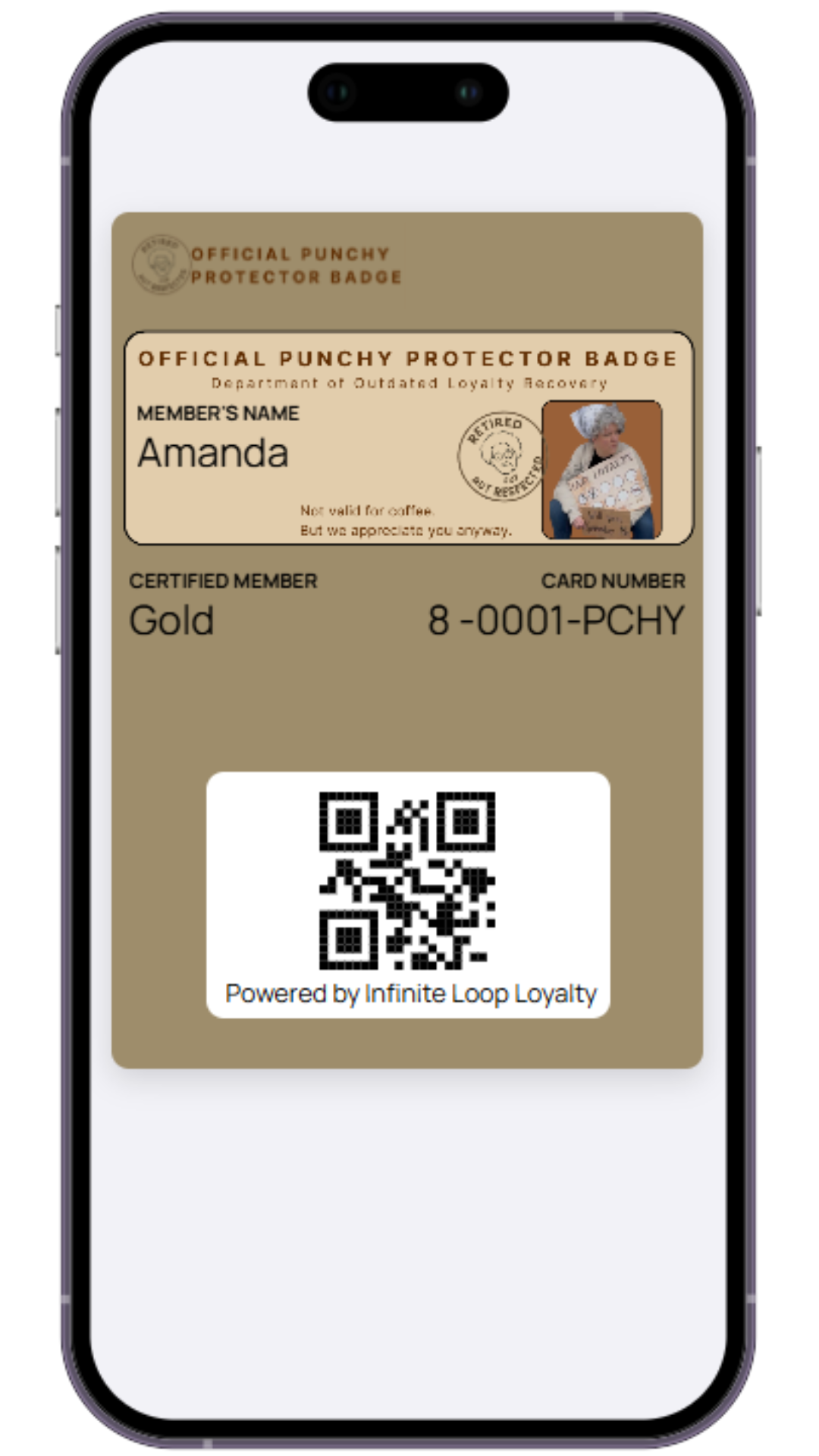 Official Punchy Protector Badge digital loyalty card mockup displayed on a phone screen, featuring a parody membership ID with the name Amanda, a photo of Punchy holding a cardboard sign, and a QR code labeled “Powered by Infinite Loop Loyalty.”