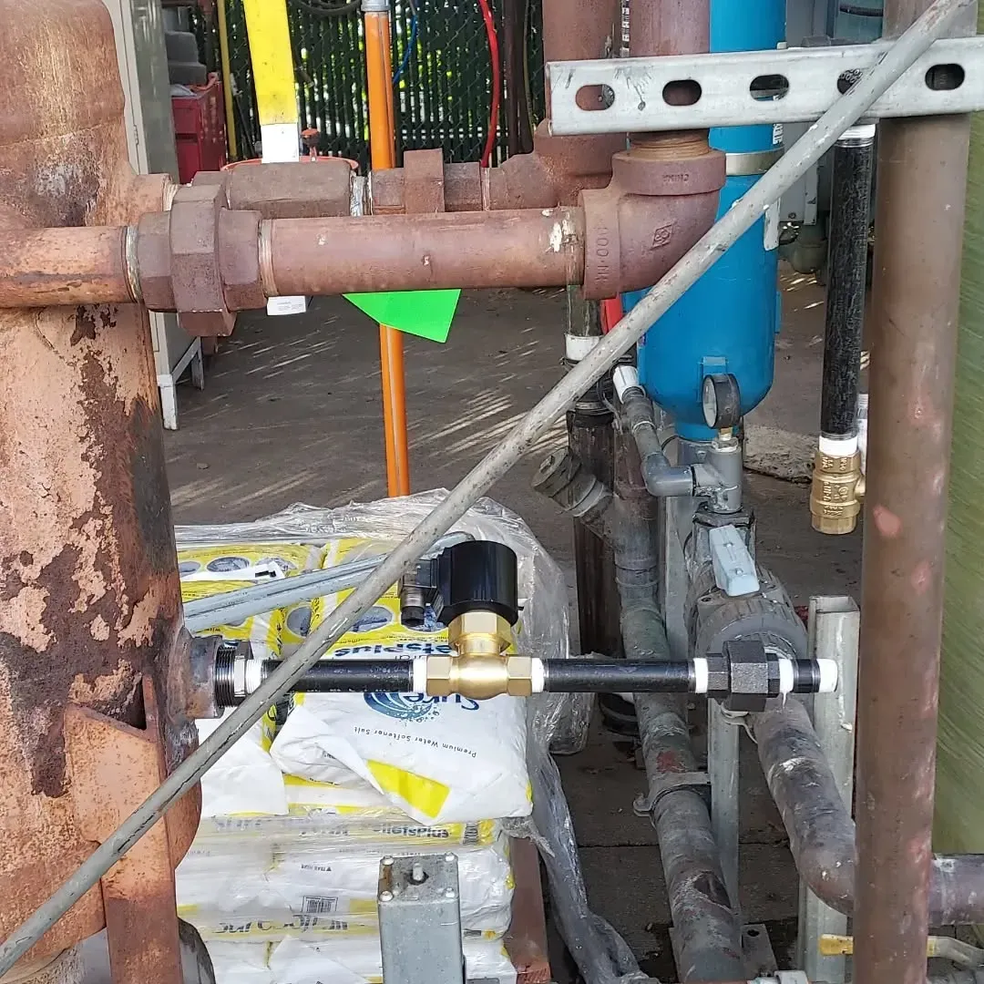 A bunch of pipes are connected to a machine