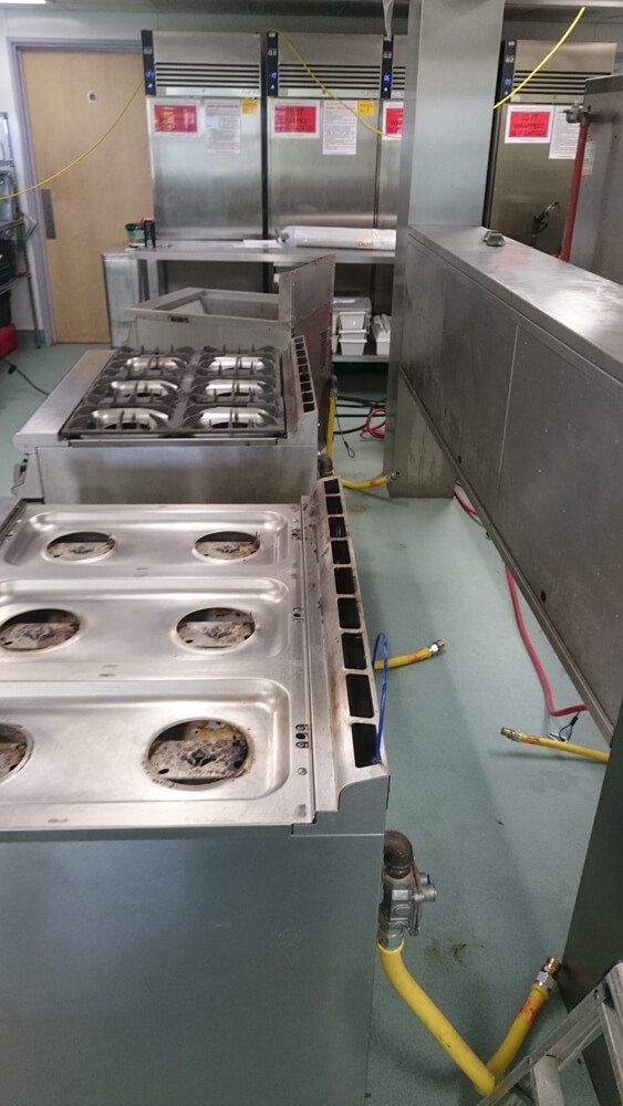 cookers being cleaned