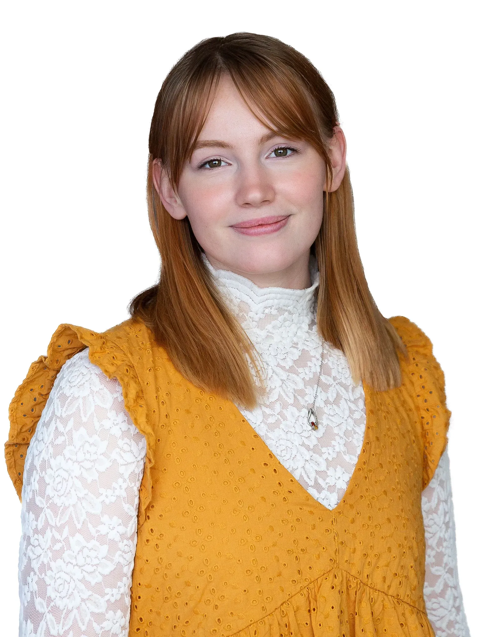 The woman is wearing a yellow dress and a white lace shirt.