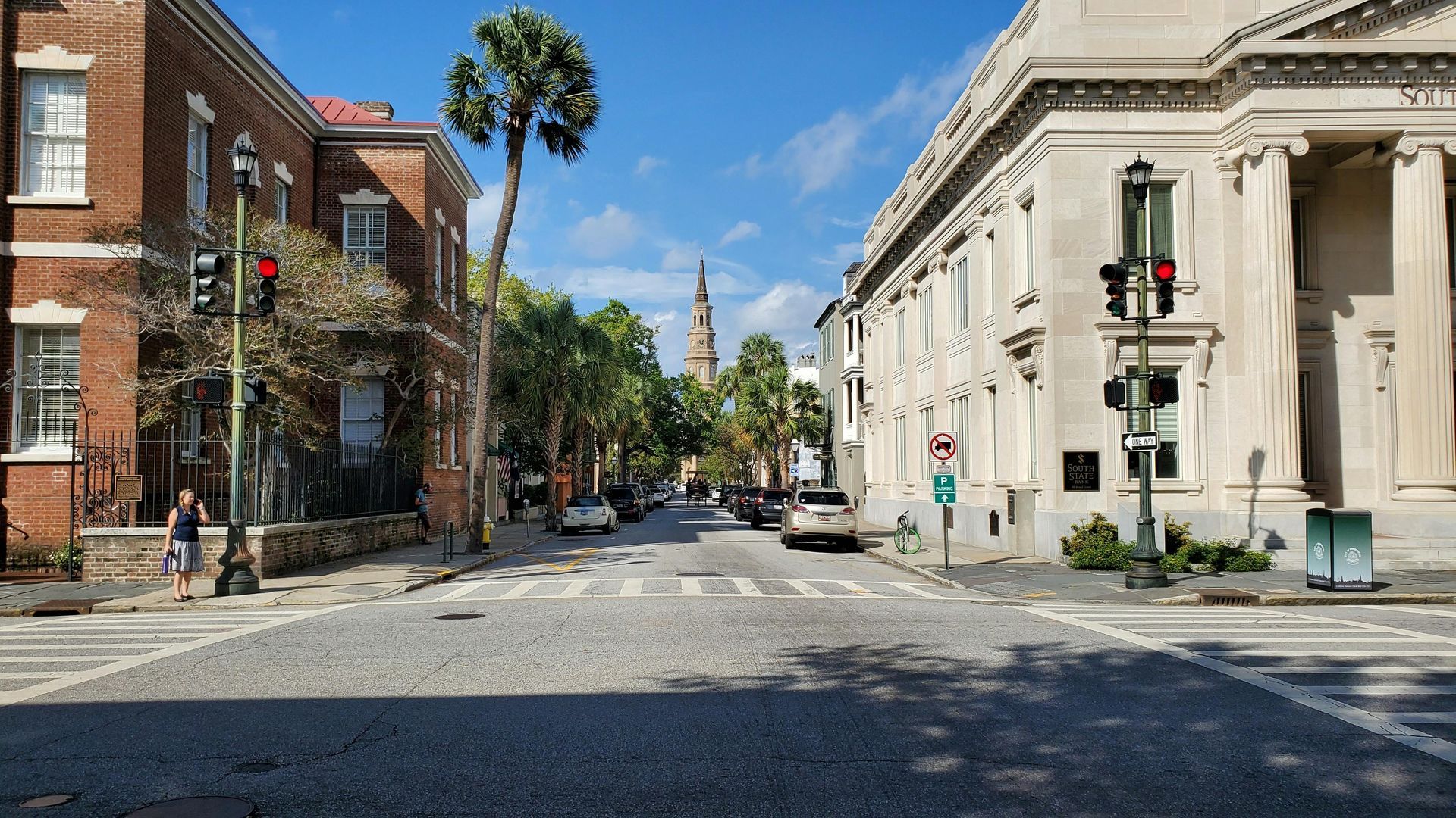 Broad Street Charleston SC road view with historic buildings and trees