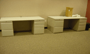 Two used white cabinet desks