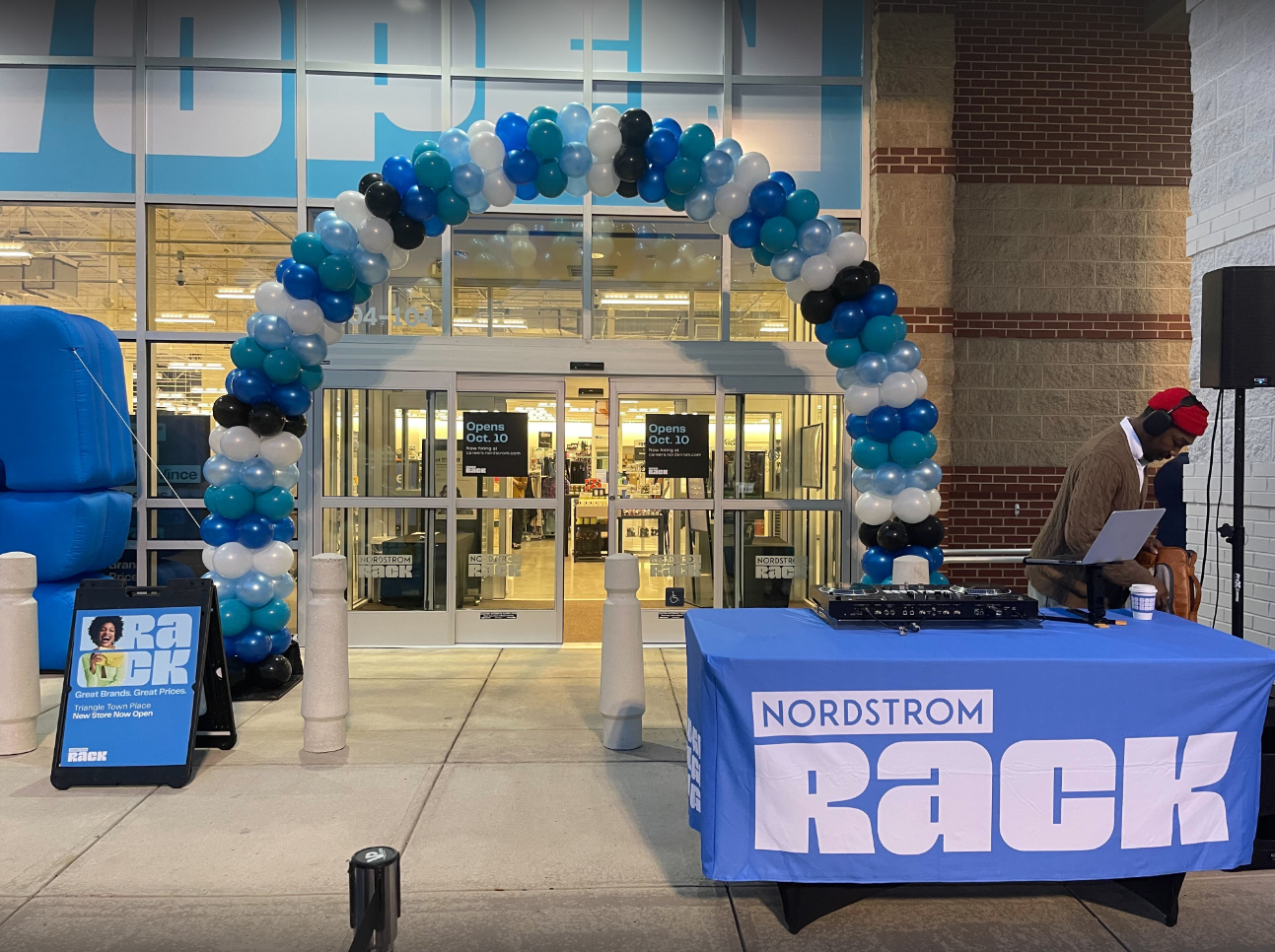 A table in front of a nordstrom rack store