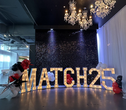 A collage of pictures of a stage decorated with balloons and letters.